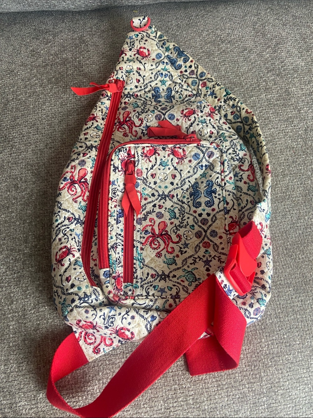 Vera Bradley Patterned Canvas Sling Bag with Red Accents